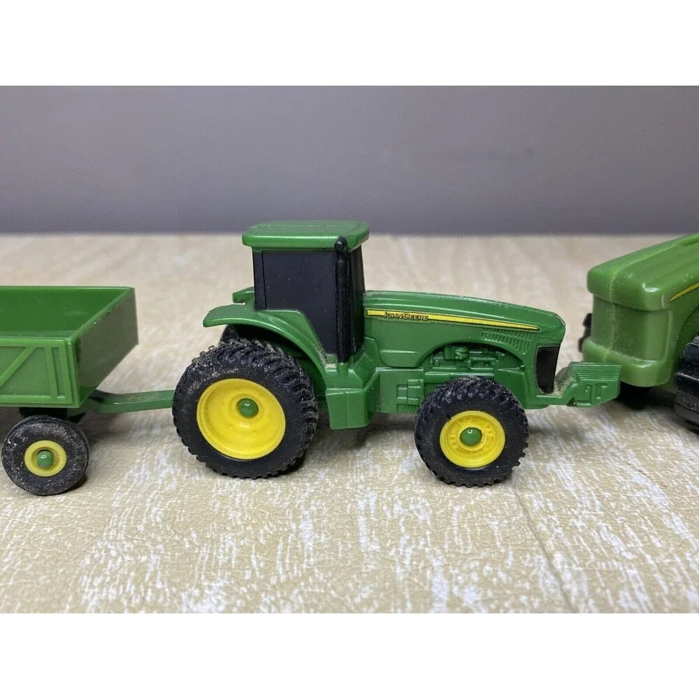 ERTL John Deere Tractor & Trailer and Stationary Plastic Tractor with 2 Rakes